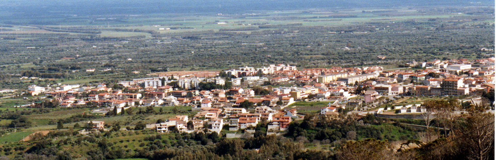 Villacidro historic village center nestled against Monte Linas