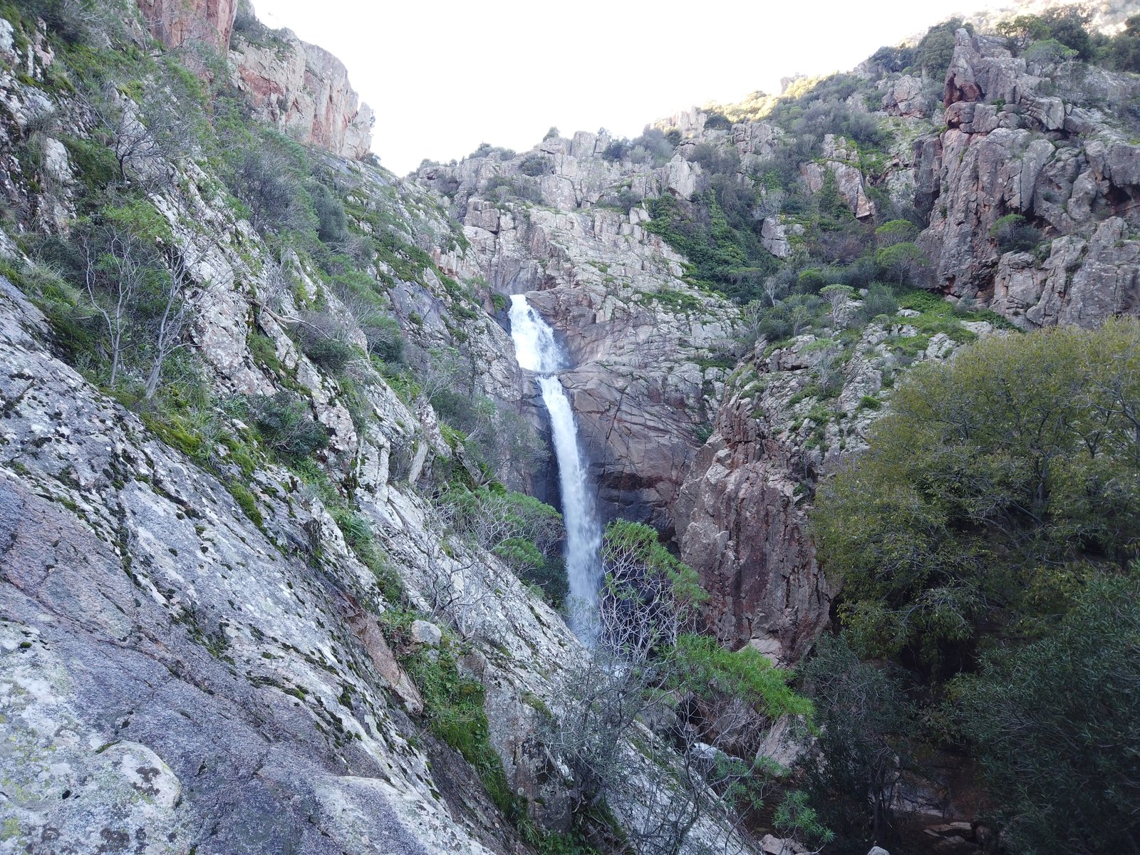 Cascata Sa Spendula waterfall surging down the granite chasm in Villacidro